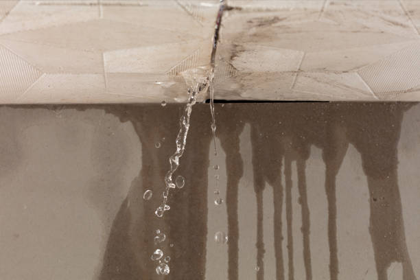 Professional Flood Damage Cleanup technician working in Glenshaw, PA
